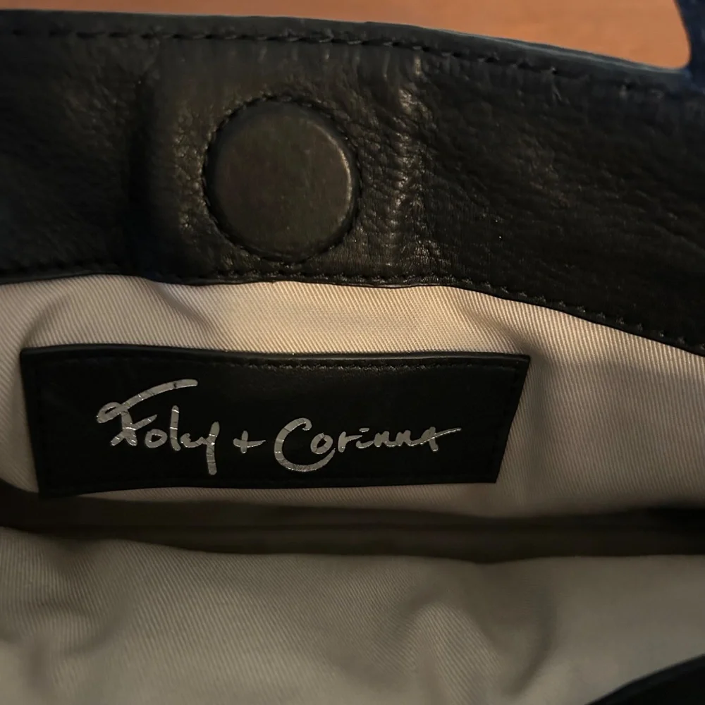 Foley & Corinna Handbag Clutch Beige Canvas Black‎ Leather Shoulder Strap Purse